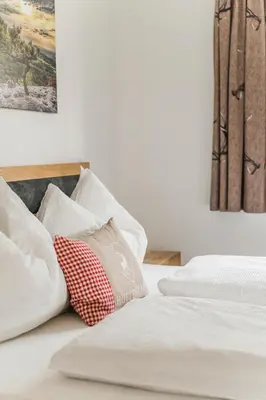 Ein Bett oder Betten in einem Zimmer der Unterkunft Dachstein West Apartments