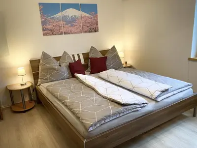 Ein Bett oder Betten in einem Zimmer der Unterkunft Apartment Bergfeeling