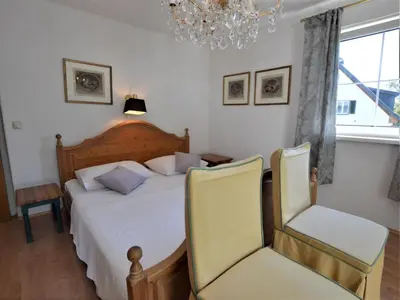 Ein Bett oder Betten in einem Zimmer der Unterkunft Landhaus Leitzinger OG1