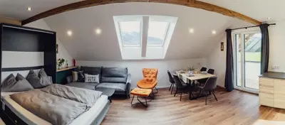 Ein Sitzbereich in der Unterkunft Aberle Apartments