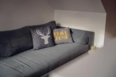 Ein Sitzbereich in der Unterkunft Aberle Apartments