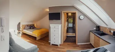 Ein Bett oder Betten in einem Zimmer der Unterkunft Aberle Apartments
