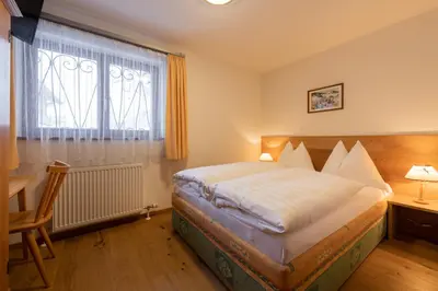 Ein Bett oder Betten in einem Zimmer der Unterkunft Haus Margareth