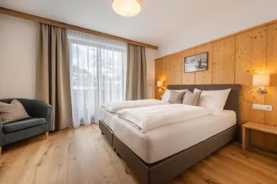 Ein Bett oder Betten in einem Zimmer der Unterkunft Haus Margareth