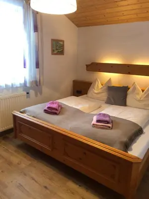 Ein Bett oder Betten in einem Zimmer der Unterkunft Haus Sabrina