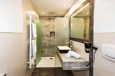 Ein Badezimmer in der Unterkunft Landhaus Alpin