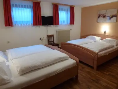 Ein Bett oder Betten in einem Zimmer der Unterkunft Ferienhaus Teigi