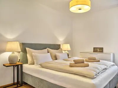 Ein Bett oder Betten in einem Zimmer der Unterkunft Panorama Lodge Auszeit 205