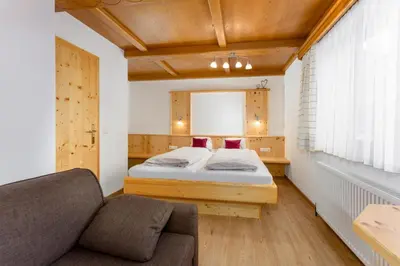 Ein Bett oder Betten in einem Zimmer der Unterkunft Winklhütte