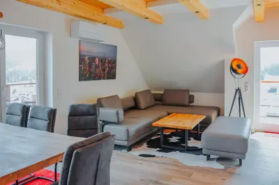 Ein Sitzbereich in der Unterkunft Downhill Lodge Tauplitz