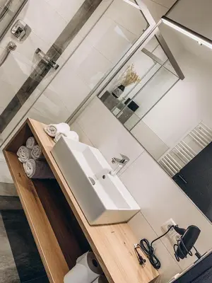 Ein Badezimmer in der Unterkunft FOUR PEAKS Apartment