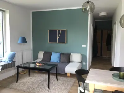 Ein Sitzbereich in der Unterkunft STEINERGUT Gartenwohnung 1
