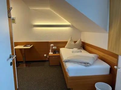 Ein Bett oder Betten in einem Zimmer der Unterkunft Villa Styria - charmante Villa in ruhiger Lage mit Sauna