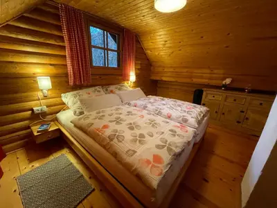 Ein Bett oder Betten in einem Zimmer der Unterkunft Ferienhütte Bosic