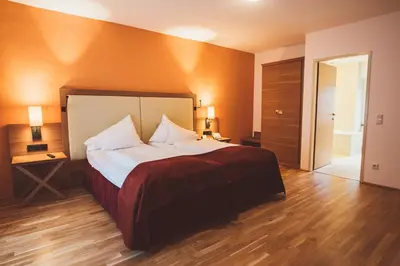Ein Bett oder Betten in einem Zimmer der Unterkunft Heritage Hotel Hallstatt