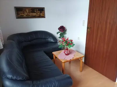 Ein Sitzbereich in der Unterkunft Gästehaus Deisl