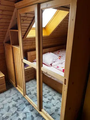 Ein Bett oder Betten in einem Zimmer der Unterkunft Gästehaus Deisl
