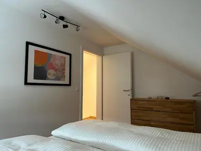 Ein Bett oder Betten in einem Zimmer der Unterkunft Ferienhaus Gmunden
