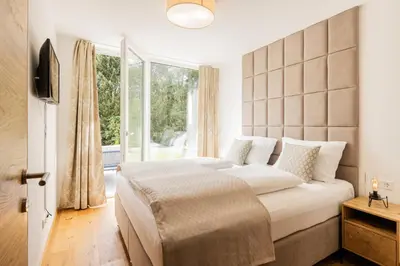 Ein Bett oder Betten in einem Zimmer der Unterkunft Granit Appartements