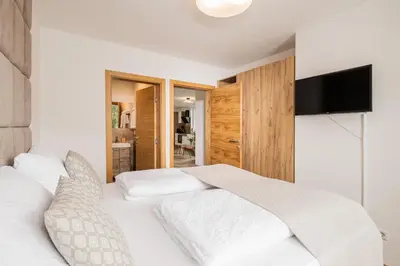 Ein Bett oder Betten in einem Zimmer der Unterkunft Granit Appartements