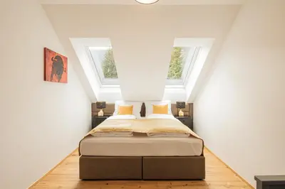 Ein Bett oder Betten in einem Zimmer der Unterkunft Granit Appartements