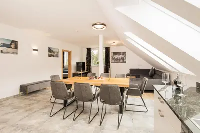 Ein Sitzbereich in der Unterkunft Granit Appartements