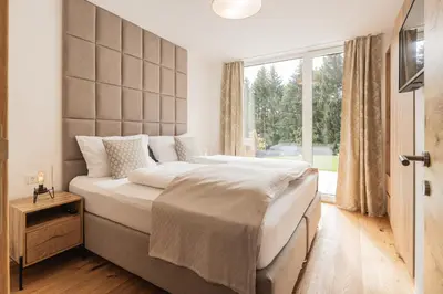 Ein Bett oder Betten in einem Zimmer der Unterkunft Granit Appartements
