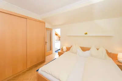 Ein Bett oder Betten in einem Zimmer der Unterkunft City Life 4 by Alpenidyll Apartments