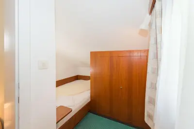 Ein Bett oder Betten in einem Zimmer der Unterkunft City Life 4 by Alpenidyll Apartments