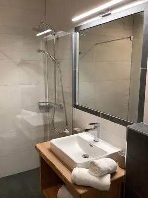 Ein Badezimmer in der Unterkunft BergLeben