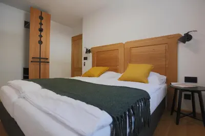 Ein Bett oder Betten in einem Zimmer der Unterkunft Schneiderhaus