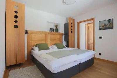 Ein Bett oder Betten in einem Zimmer der Unterkunft Schneiderhaus