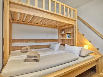 Ein Bett oder Betten in einem Zimmer der Unterkunft Sunlodge Oeblarn Top B1 Schladming-Dachstein