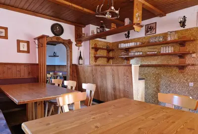 Ein Restaurant oder anderes Speiselokal in der Unterkunft Almhof Grub