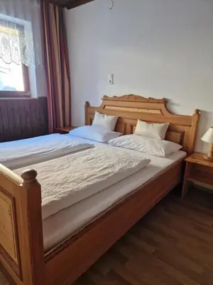 Ein Bett oder Betten in einem Zimmer der Unterkunft Almhof Grub