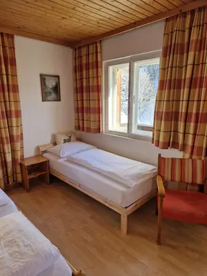 Ein Bett oder Betten in einem Zimmer der Unterkunft Almhof Grub