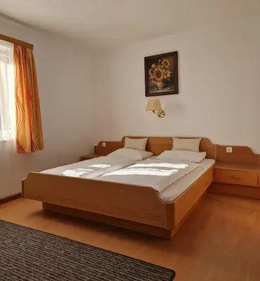 Ein Bett oder Betten in einem Zimmer der Unterkunft Almhof Grub