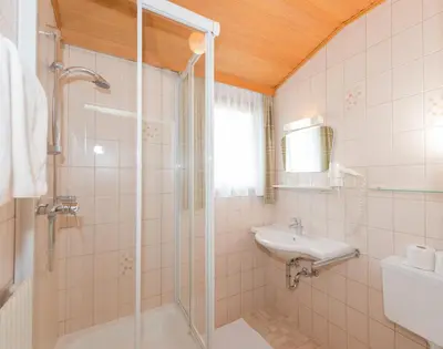 Ein Badezimmer in der Unterkunft City Life 5 by Alpenidyll Apartments
