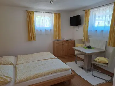 Ein Bett oder Betten in einem Zimmer der Unterkunft Appartement Flachauliebe