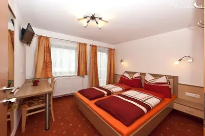 Ein Bett oder Betten in einem Zimmer der Unterkunft Appartement Haus Burgblick