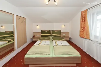 Ein Bett oder Betten in einem Zimmer der Unterkunft Appartement Haus Burgblick