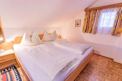 Ein Bett oder Betten in einem Zimmer der Unterkunft City Life 6 by Alpenidyll Apartments