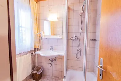 Ein Badezimmer in der Unterkunft City Life 6 by Alpenidyll Apartments