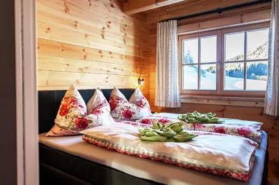 Ein Bett oder Betten in einem Zimmer der Unterkunft Köck-Chalet