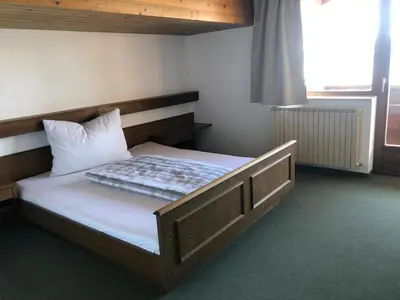 Ein Bett oder Betten in einem Zimmer der Unterkunft Ferienhaus Gerti Werfenweng