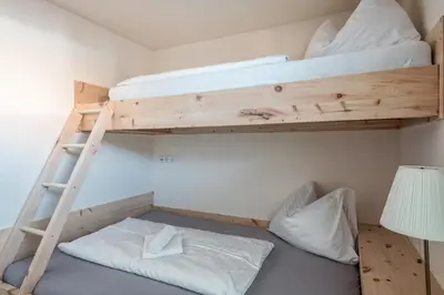 Ein Bett oder Betten in einem Zimmer der Unterkunft Penthouse „Das Besenhaus“