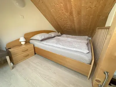 Ein Bett oder Betten in einem Zimmer der Unterkunft Chalet Falkenstein