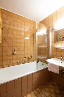 Ein Badezimmer in der Unterkunft Sporthotel Flachauwinkl