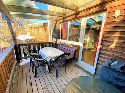 Ein Balkon oder eine Terrasse in der Unterkunft EXCLUSIVES Chalet an der SKIPISTE +Dampfbad +NETFLIX