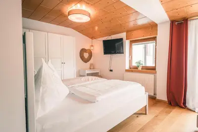 Ein Bett oder Betten in einem Zimmer der Unterkunft casa wii